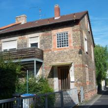 ehem. Jutesiedlung, Haus mit historischer Backsteinvermauerung (Foto 2011)